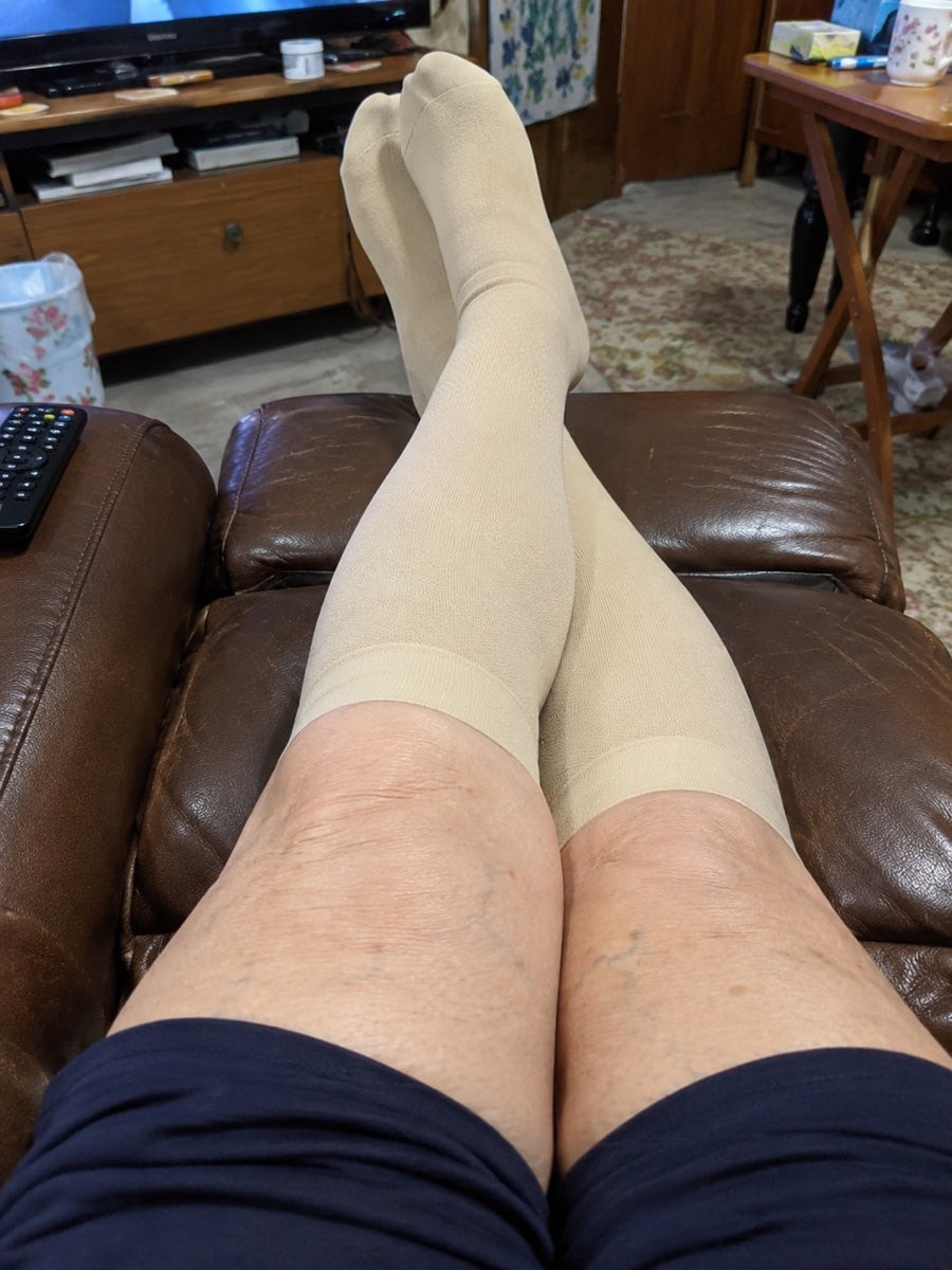 Photo 4:3 — legs up at home in bamboo socks